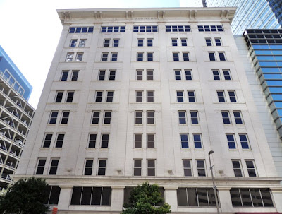 Stowers Building slated for redevelopment - angled-up up of facade on Fannin Street 