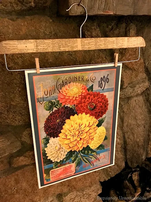 Rustic Seed Packet Print hanging on stone fireplace