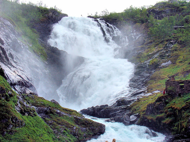 Beware of the Huldra who dwell in these sylvan lands! Here's a shot of Kjosfossen (Kjos Waterfall)and if you look carefully, you can see these mysterious sirens at the right center of the picture.