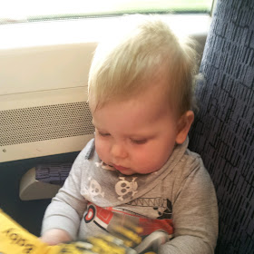 baby on train, cute baby, blonde haired boy
