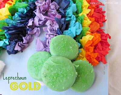 rainbow tissue paper with green chocolate dipped ritz crackers at end and words