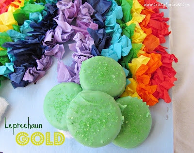 Leprechaun Gold {dipped peanut butter crackers} by www.www.crazyforcrust.com rainbow tissue paper with green chocolate dipped ritz crackers at end and words