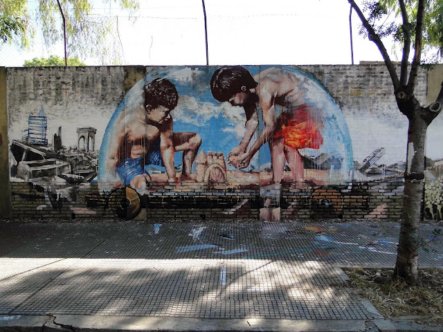 "Castles In The Sand" New Street Art Collaboration by Australian artist Fintan Magee and Martin Ron in Buenos Aires. 2
