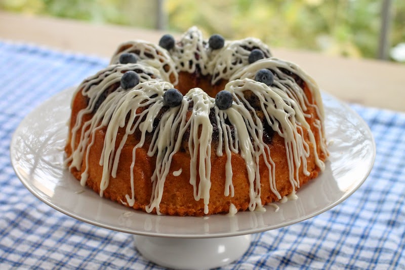 Food Lust People Love: This Lemon Blueberry Van Halen Bundt is a rich and buttery pound cake, filled with cream cheese and blueberries then drizzled with a lemon cream cheese glaze.