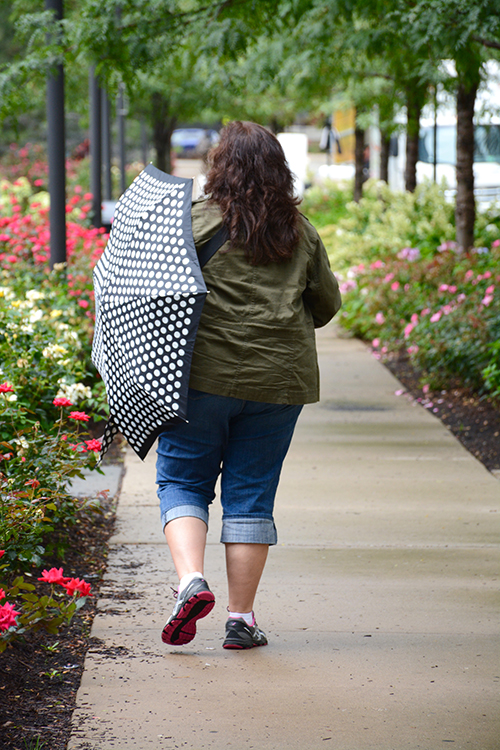 mom walking with umbrella mom walking with umbrella