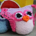 http://www.craftsy.com/pattern/crocheting/toy/owl-rattle-crochet-pattern/209920?rceId=1467142099957~e9pdc6md