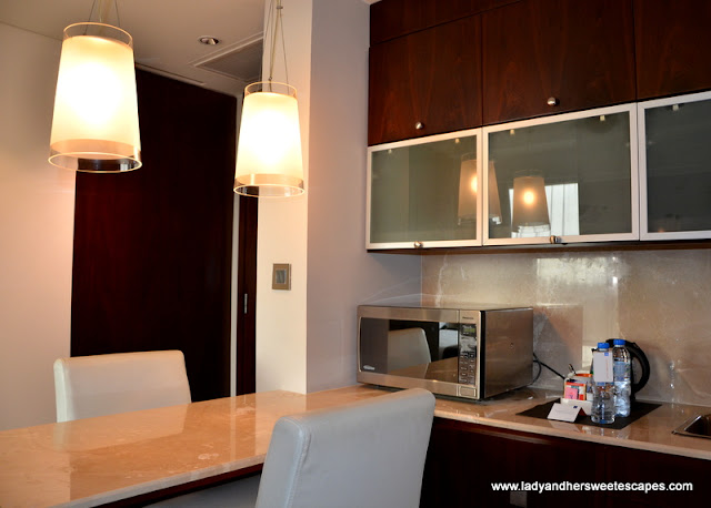 compact kitchenette at Centro Sharjah hotel
