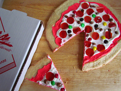 overhead shot of cookie pizza that looks like a pepperoni pizza