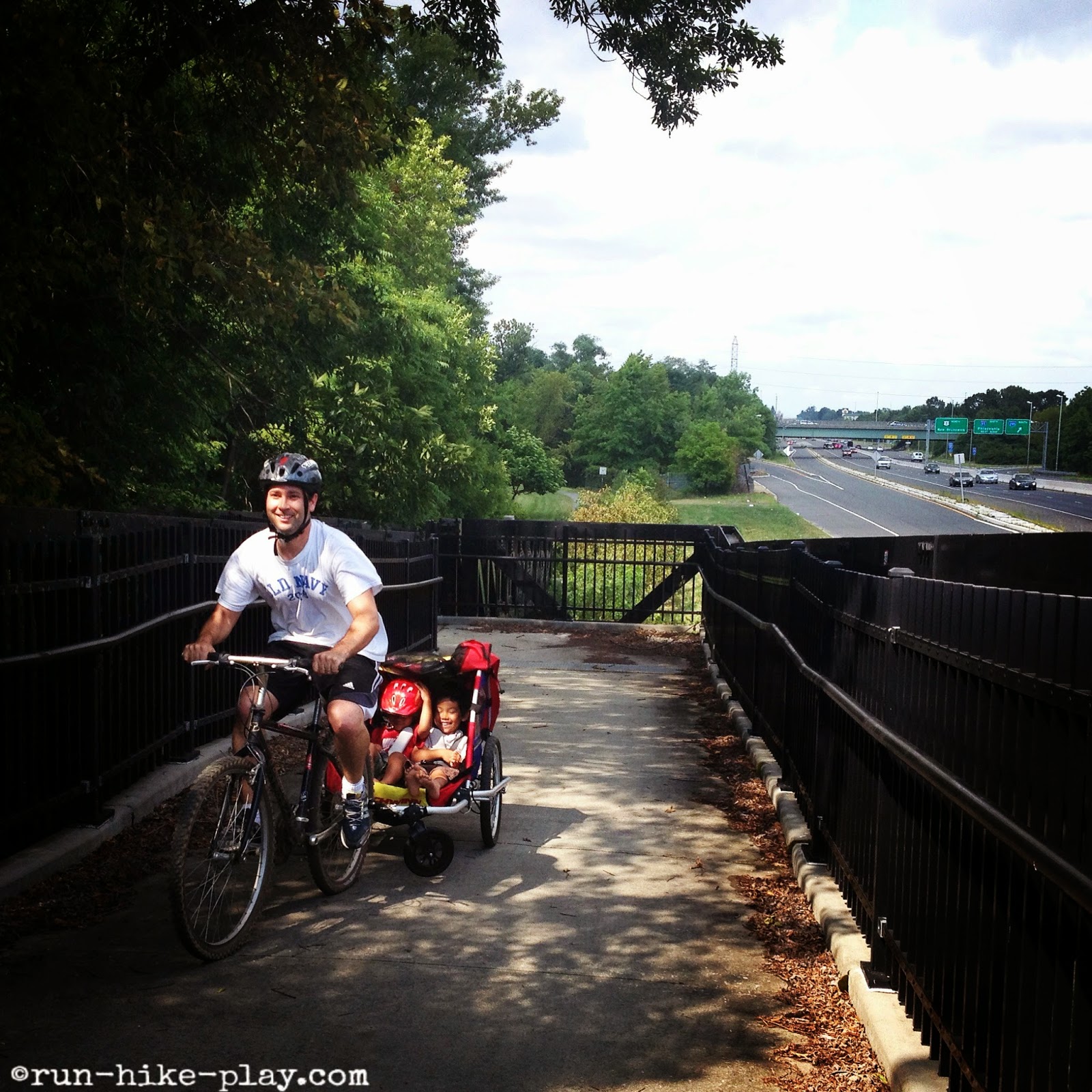 biking onto bridge on D&R Canal Trail