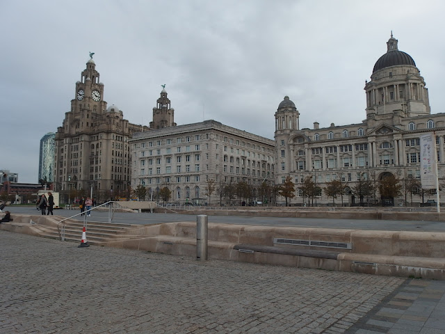 From left to right: the Royal Liver building, the Cunard building, and part of the Port of Liverpool building aka Liverpool's 'The Three Graces'