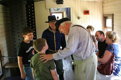 Conductor bringing grant along to help