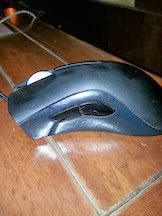 RAZER DeathAdder Gaming Mouse Advertisement: Buttons and Scroller Design