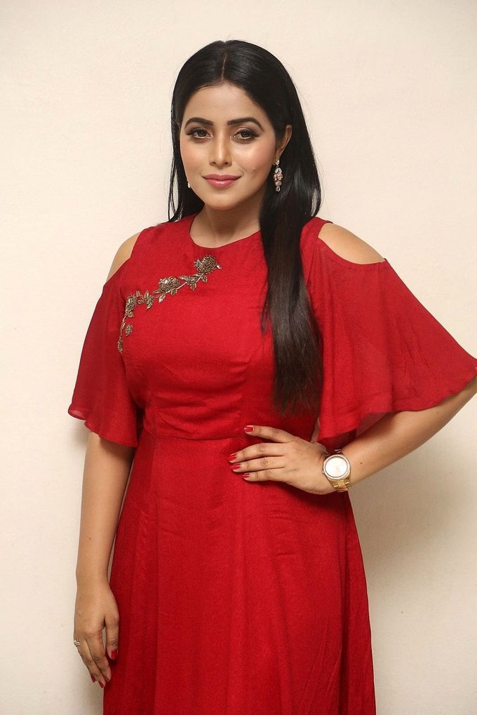 Beautiful Telugu Girl Poorna Long Hair Stills In Red Dress