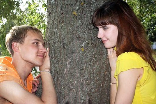 Boy And Girl Looking At Each Other