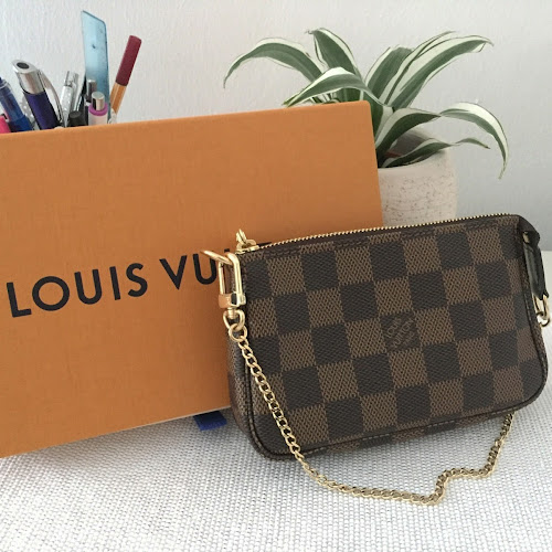 This mini version of the iconic Louis Vuitton style is the perfect size for  an every day carry; the Alma BB fits the typical…