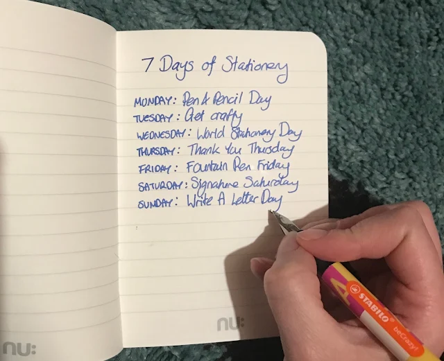 An open notepad from Nuco with the 7 days of stationery being written in it with a Stabilo beCrazy pink yellow and orange fountain pen