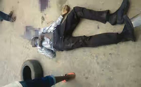 Photo: Fleeing Driver Crushes Tricycle Driver To Death Photo: Fleeing Driver Crushes Tricycle Driver To Death
