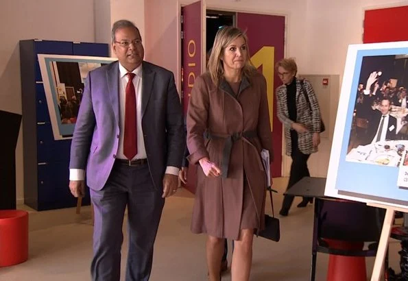 Queen Maxima met with people during a working visit to Schuldenlab070 (Debt Lab070) in The Hague.Natan dress