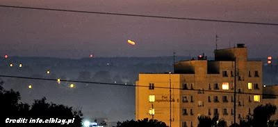 UFOs Photographed Over Polish Town of Elblag 9-29-13