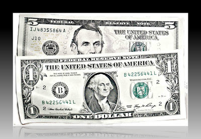 Billetes de Dólares con las caras de Lincoln y Washington