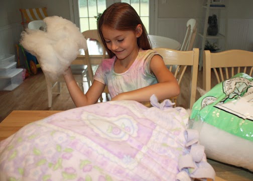 Stuffing the bed with fiberfill was by far Tessa's favorite part. She had so much with it and did a good job after I explained that it's best to use large handfuls to keep lumps at bay.