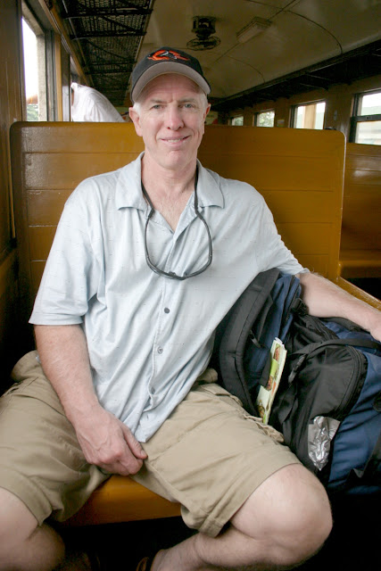 Jim in the 1950's train heading out to the country and Kanchanburi