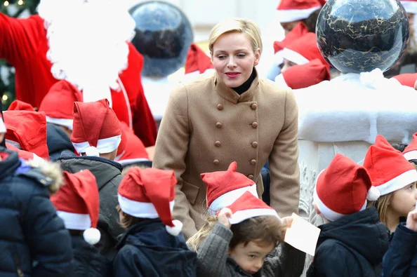 Princess Charlene of Monaco and Prince Albert II of Monaco attend the Christmas Celebration