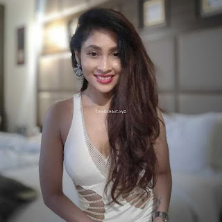 Sunanda Wong looks cute innocent in Saree and Deep Neck Choli .XYZ Exclusive