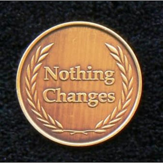 A coin depicting that nothing changes within the UK Care System and the CQC