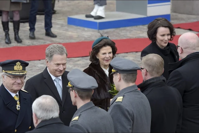 King Carl XVI Gustaf of Sweden, Finland's President Sauli Niinisto, Queen Silvia of Sweden and Niinisto's wife Jenni Haukio attend a welcoming ceremony at the Presidential Palace in Helsinki