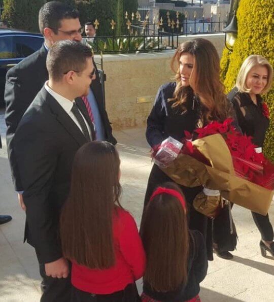 Queen Rania wore a navy two tone beldet print dress and Dior calfskin leather pumps. She carried Givenchy mini GV3 bag