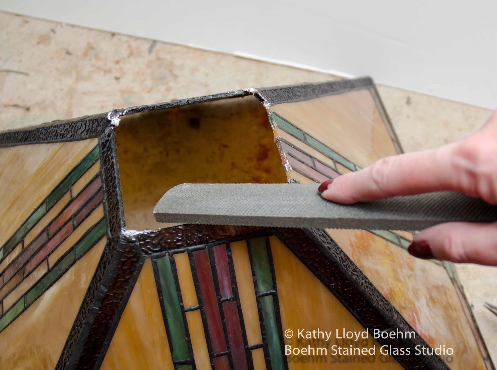 Boehm Stained Glass Blog Replacing Cap onto Stained Glass Lamp