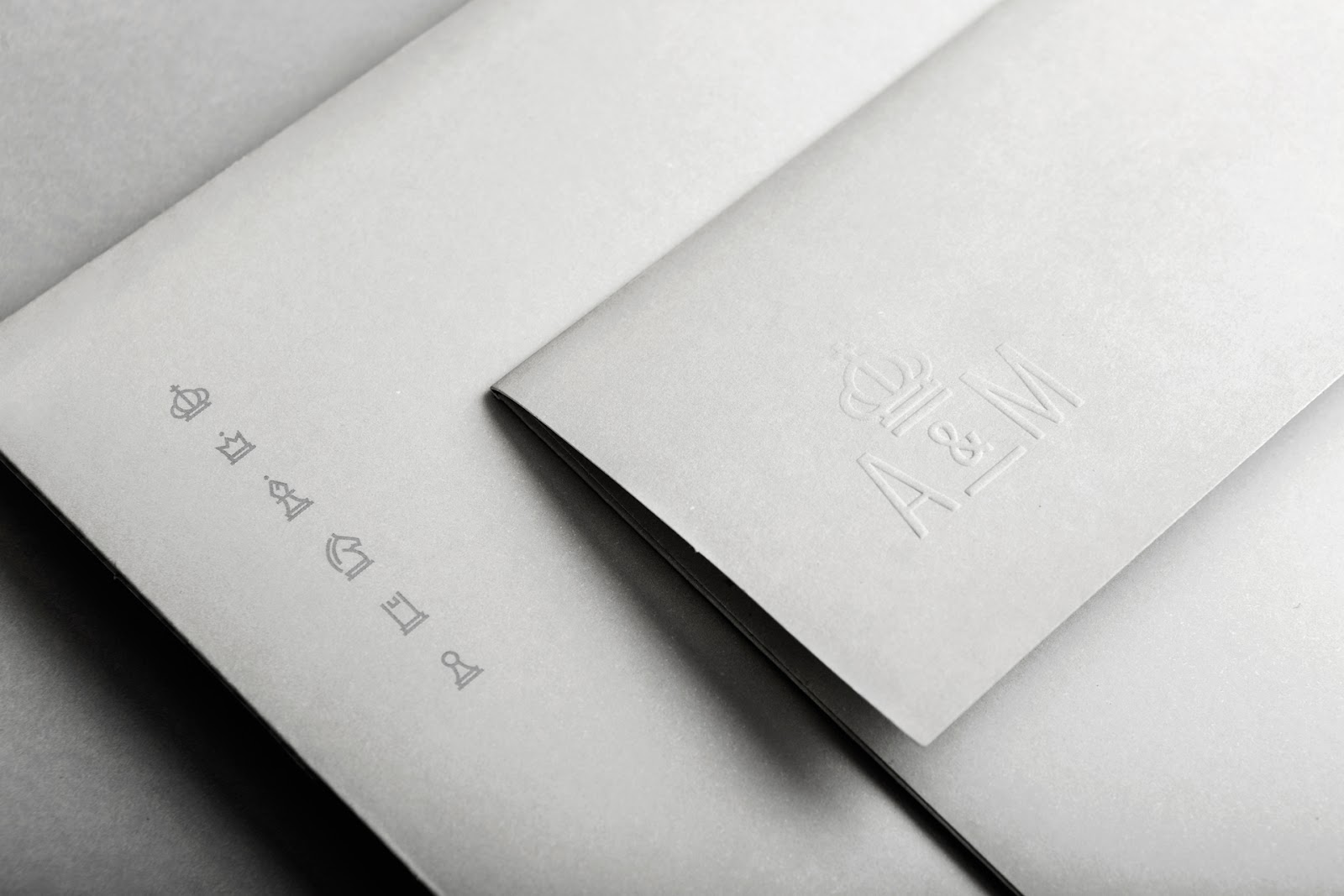 Good design makes me happy Andrade & Muller Brand Identity