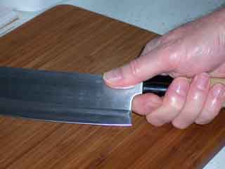 Thumb down one side, tuck the rest