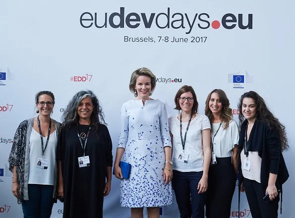 Queen Mathilde attended the opening ceremony of European Development Days at Tour et Taxi and held a lunch at Laken Royal Palace. Queen wore Natan Dress, Clutc and Pumps 