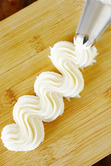 How to Make Cream Cheese Frosting Image ~ whip up a creamy-textured, perfectly not-too-sweet batch!  www.thekitchenismyplayground.com
