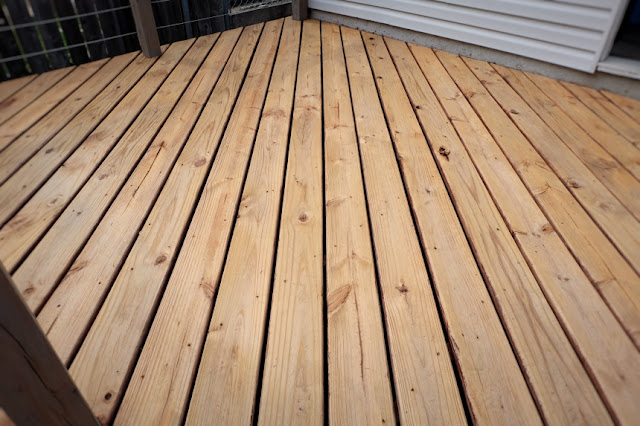 finished stripping wood deck of stain