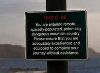 Danger sign warning you are entering a remote area...