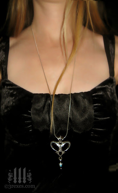 silver queen of  hearts gothic necklace with garnets 