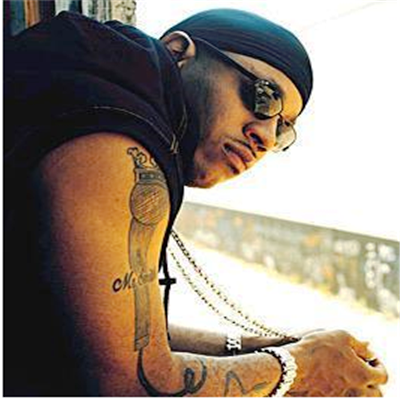 Tattoo Description LL Cool J's Right Arm Tattoo Mr Smith over a large 