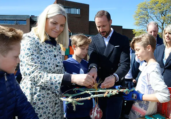 Princess Mette-Marit and Prince Haakon attended the opening of the exhibition "Hope for the Ocean" (Håp for havet) Mette-Marit wore Valantino dress, jewelery style