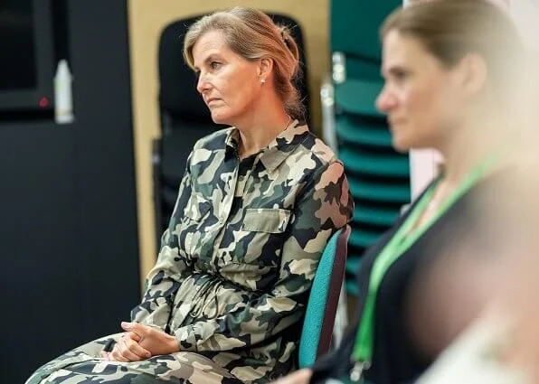 During her visit, the Countess of Wessex wore a camouflage shirt dress by French Connection