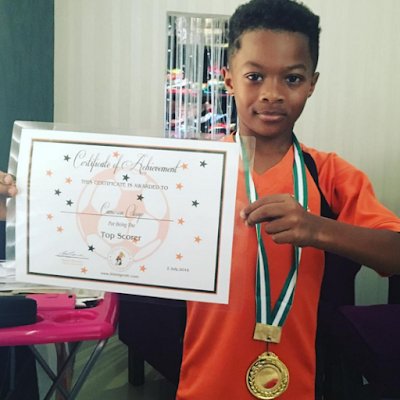 Peter Okoye celebrates his son, Cameron, for winning as top scorer at his football academy