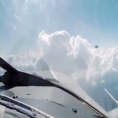 UFO diving through the clouds to get away from the Jet.