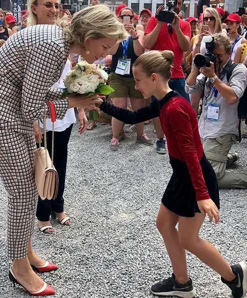 Queen Mathilde visited the Eurogym 2018 International Gymnastics FestivalShe wore Natan pantsuit Natan Collection, Armani clutch