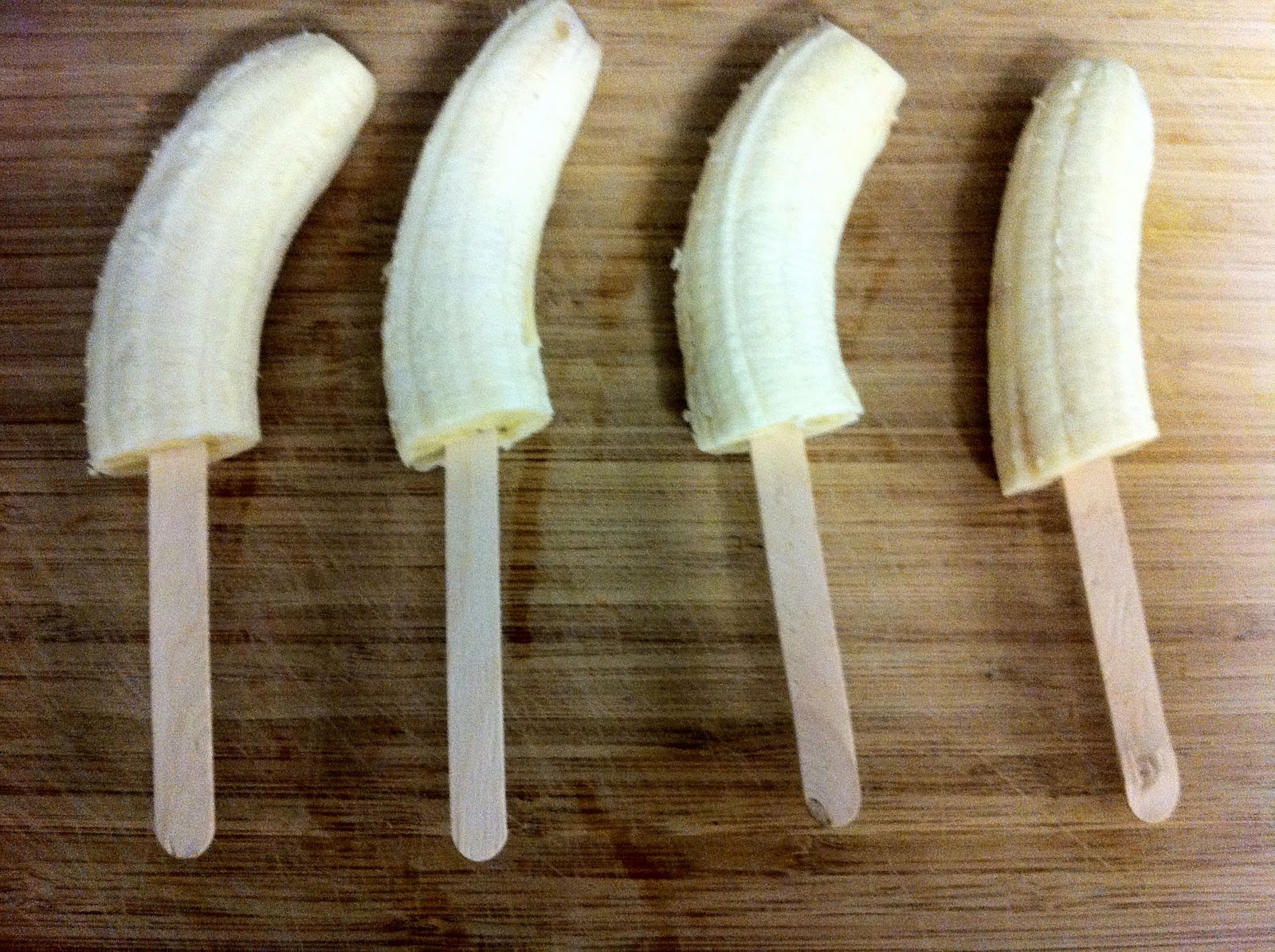 Skinny Healthy Lifestyle Frozen chocolate “ChocTop” banana on a stick