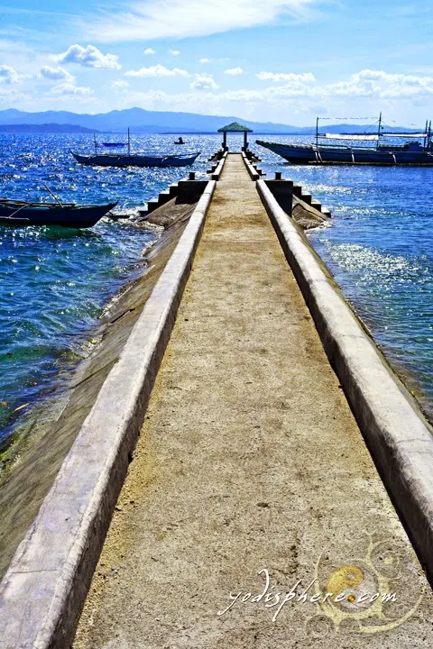 hover_share Scenic pier of Mongpong Island in Marinduque