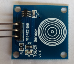 Touch Sensor Module along with Small DC Motor Project for Arduino image.