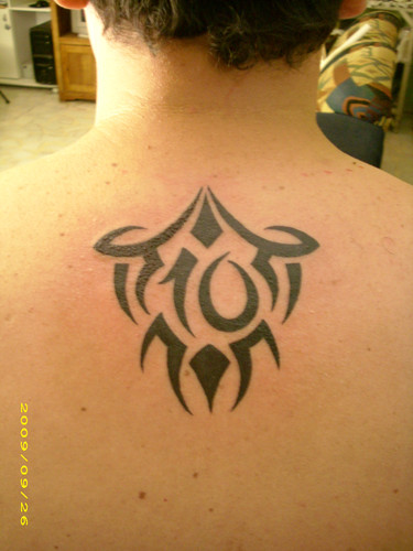 tribal heart tattoo for men Men tribal tattoos, Tribal tattoos for men, Upper back tribal tattoos