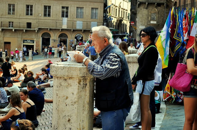 Gentleman in the Crowd on the Piazza del Campo in Siena, Italy | Taste As You Go